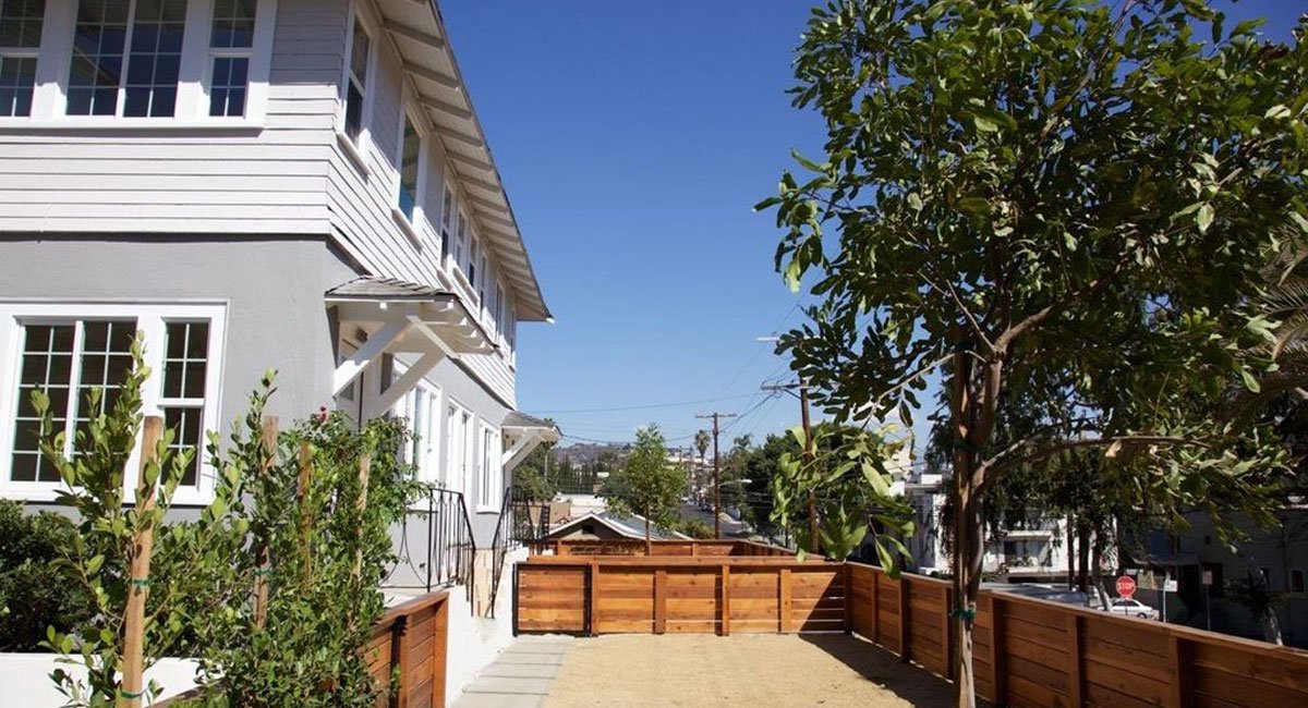 Finished duplex side yard and fence