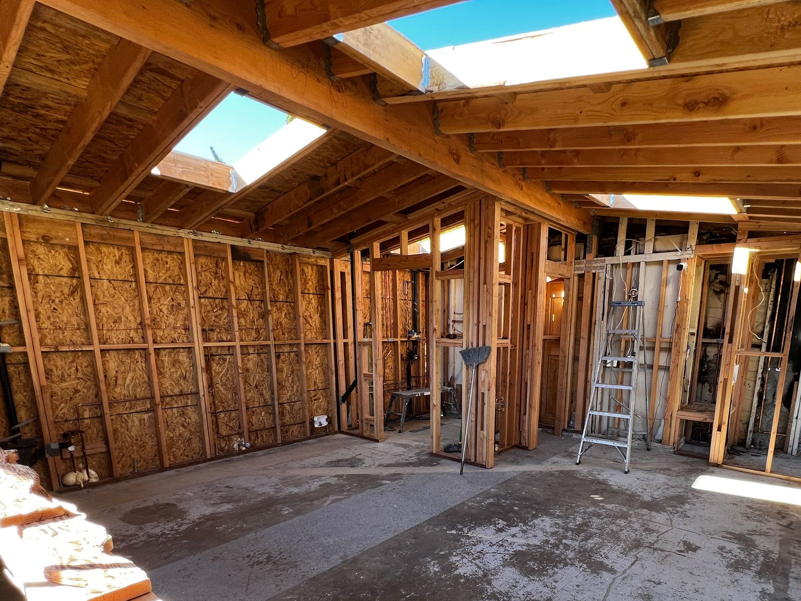 Roof framing, insulation and skylight openings during construction